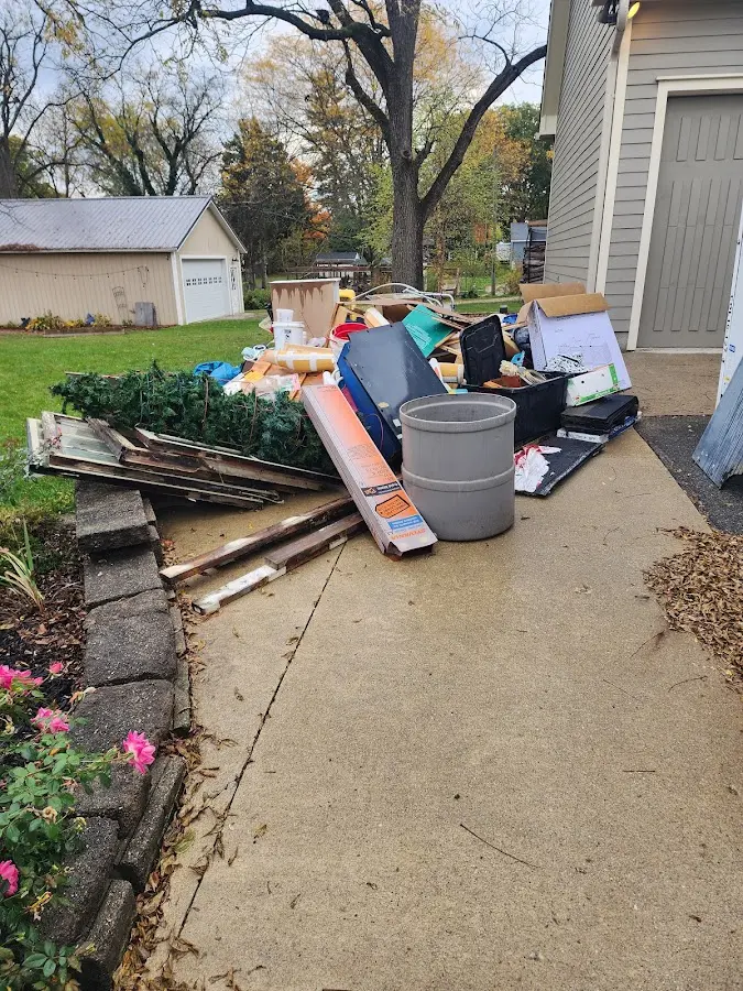 Dumpster being loaded with debris for 30 Yard Dumpster Rental in Palo Alto